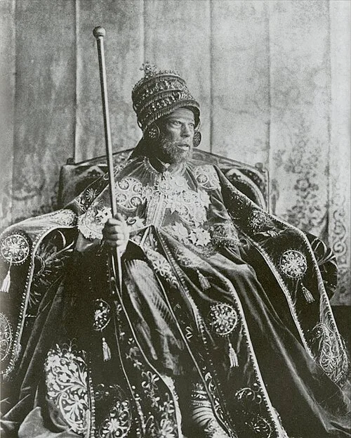 Menelik II.